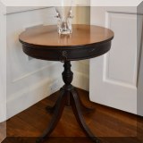 F09. Mahogany pedestal side table. 24”h x 20”w 